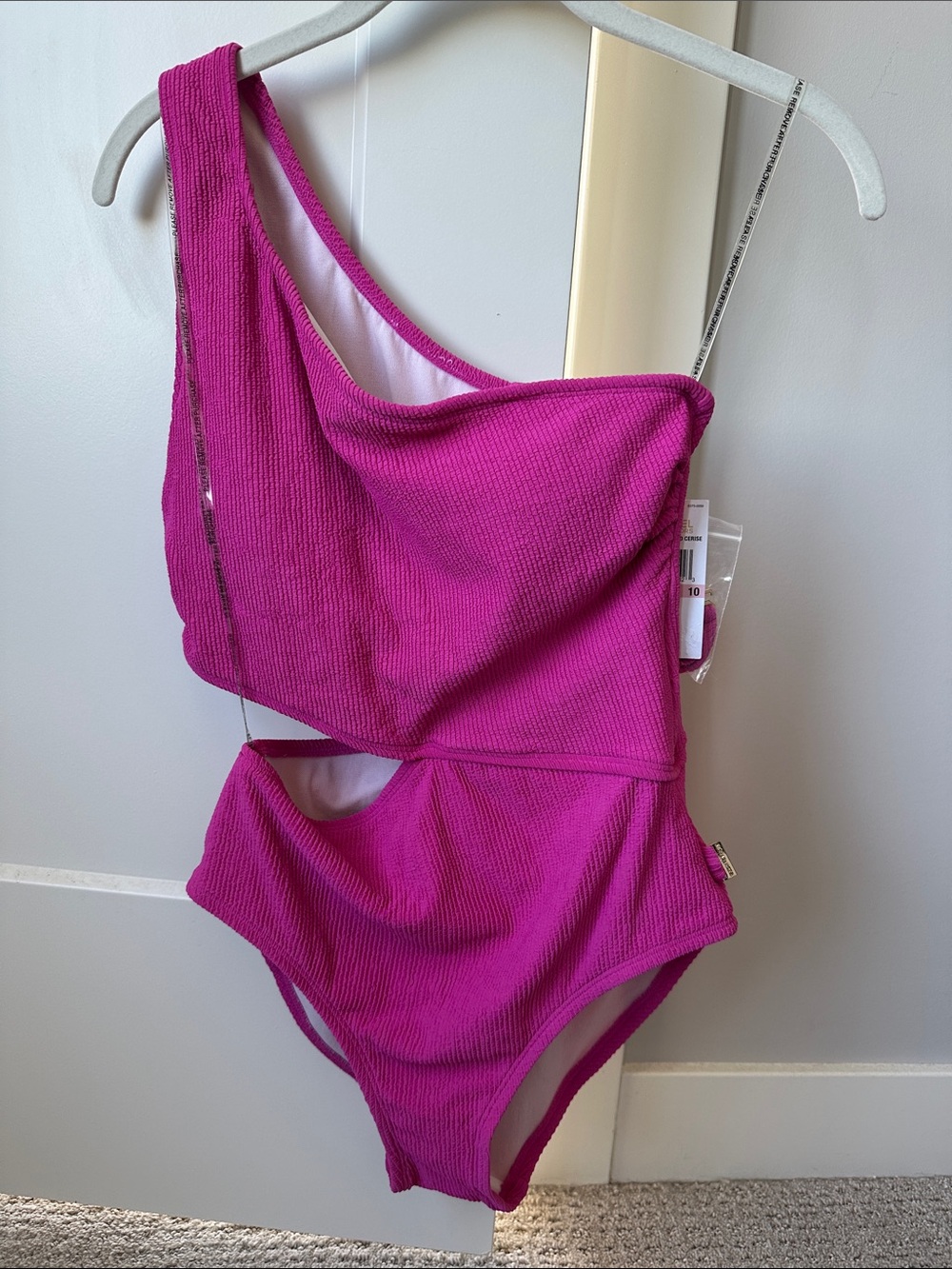 MICHAEL Michael Kors One-Shoulder Cutout Swimsuit in hot pink